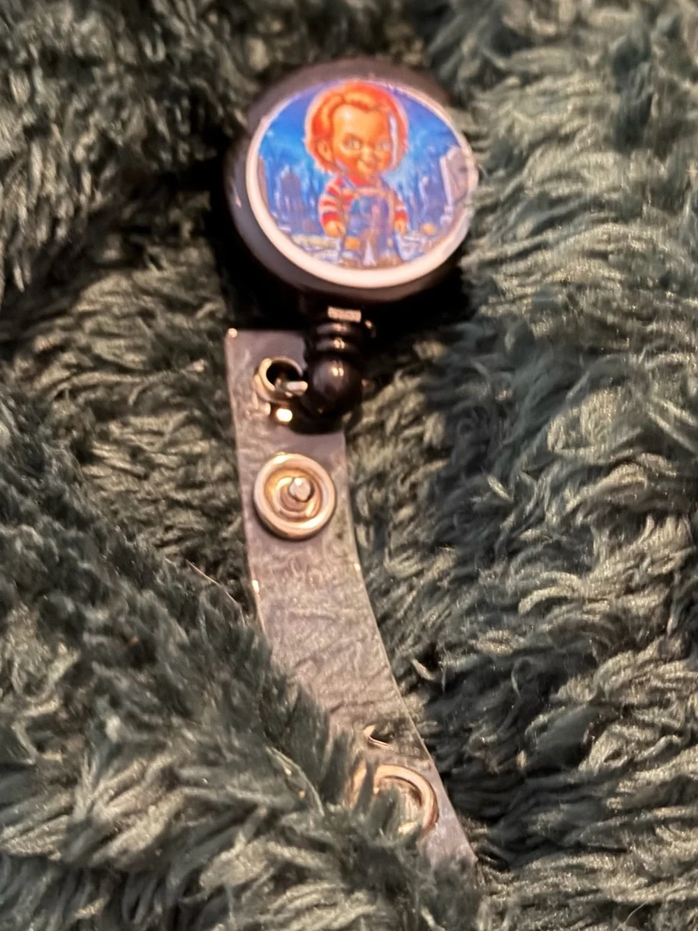 Black Novelty Badge Reel with Character Art